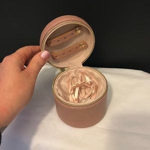 Rose colored travel jewelry case- circle